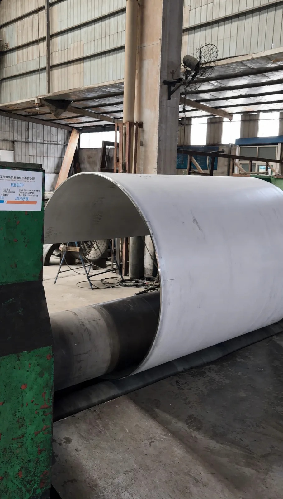 Rear view of a formed cylindrical section on NOKX rolling machine number two