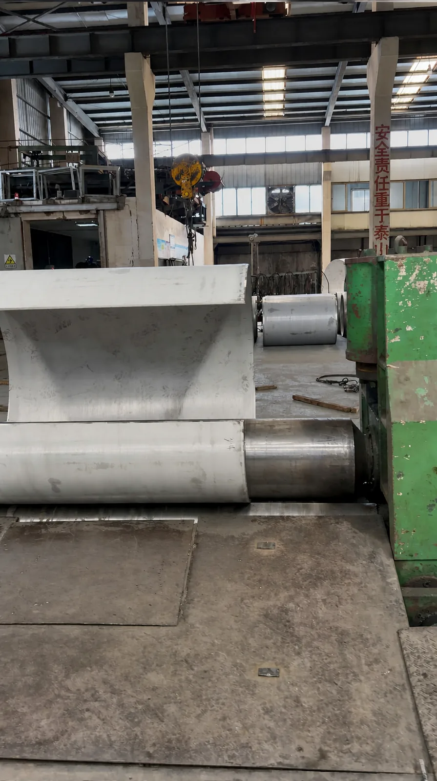 NOKX plate rolling machine number two forming a stainless steel section